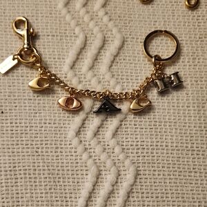 Coach Gold and Black Letter Charm Keychain